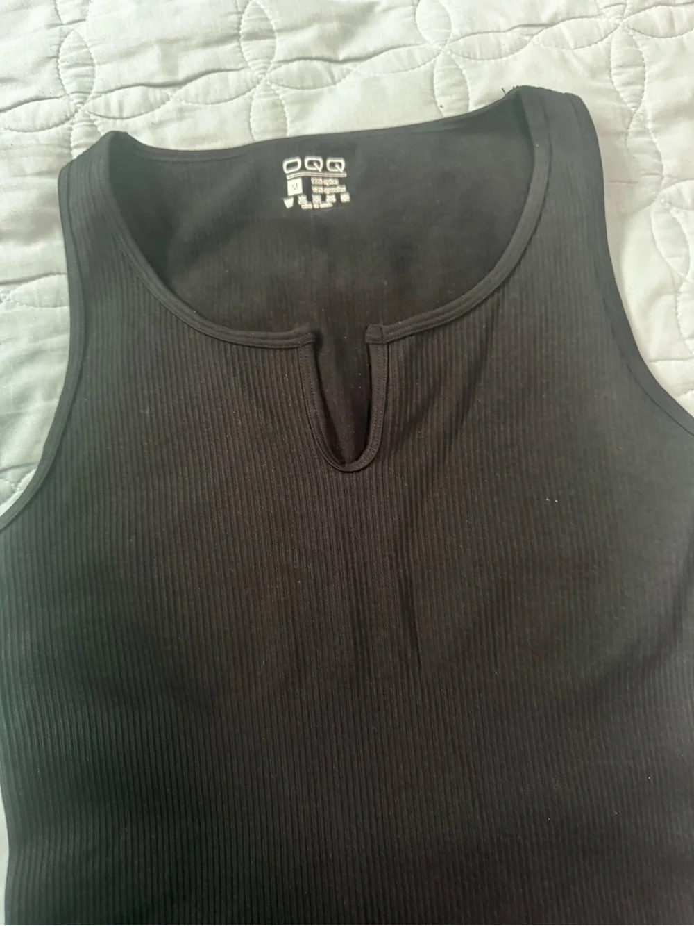 OQQ Black Ribbed One-Piece Bodysuit Sz M